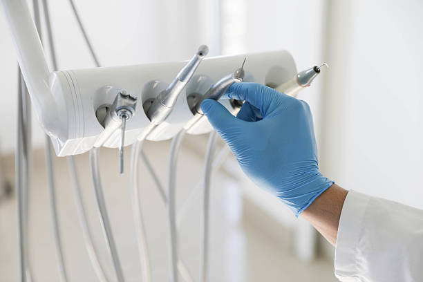 Professional Tooth Extraction technician working in Lenoir County County, NC
